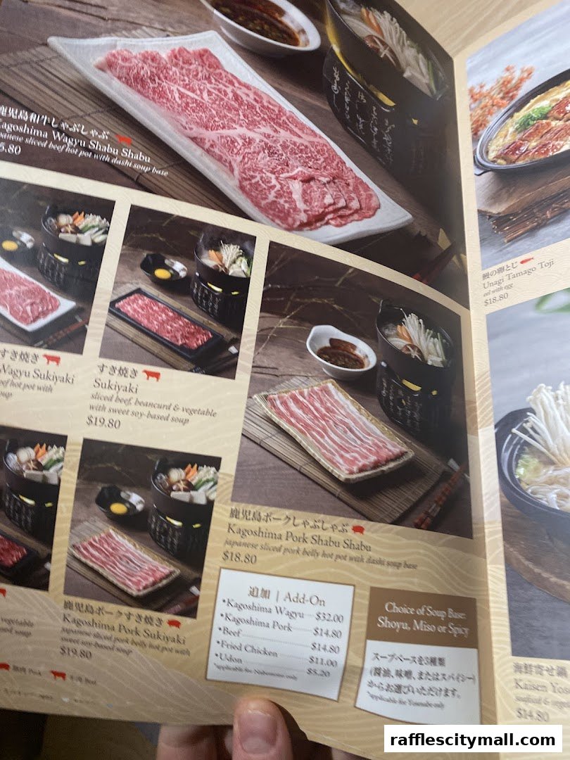 A menu from Sushi Tei featuring various shabu shabu and sukiyaki dishes with premium beef and pork.