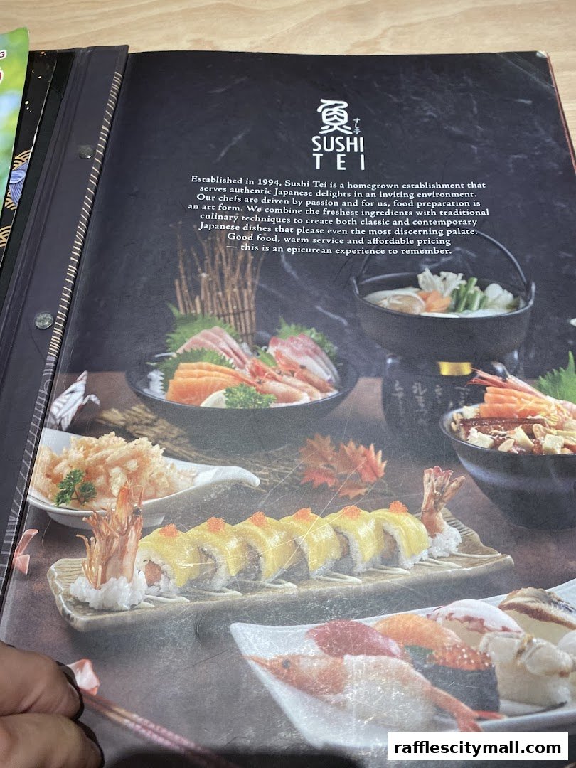 A menu from Sushi Tei showcasing various Japanese dishes, including sushi and sashimi.