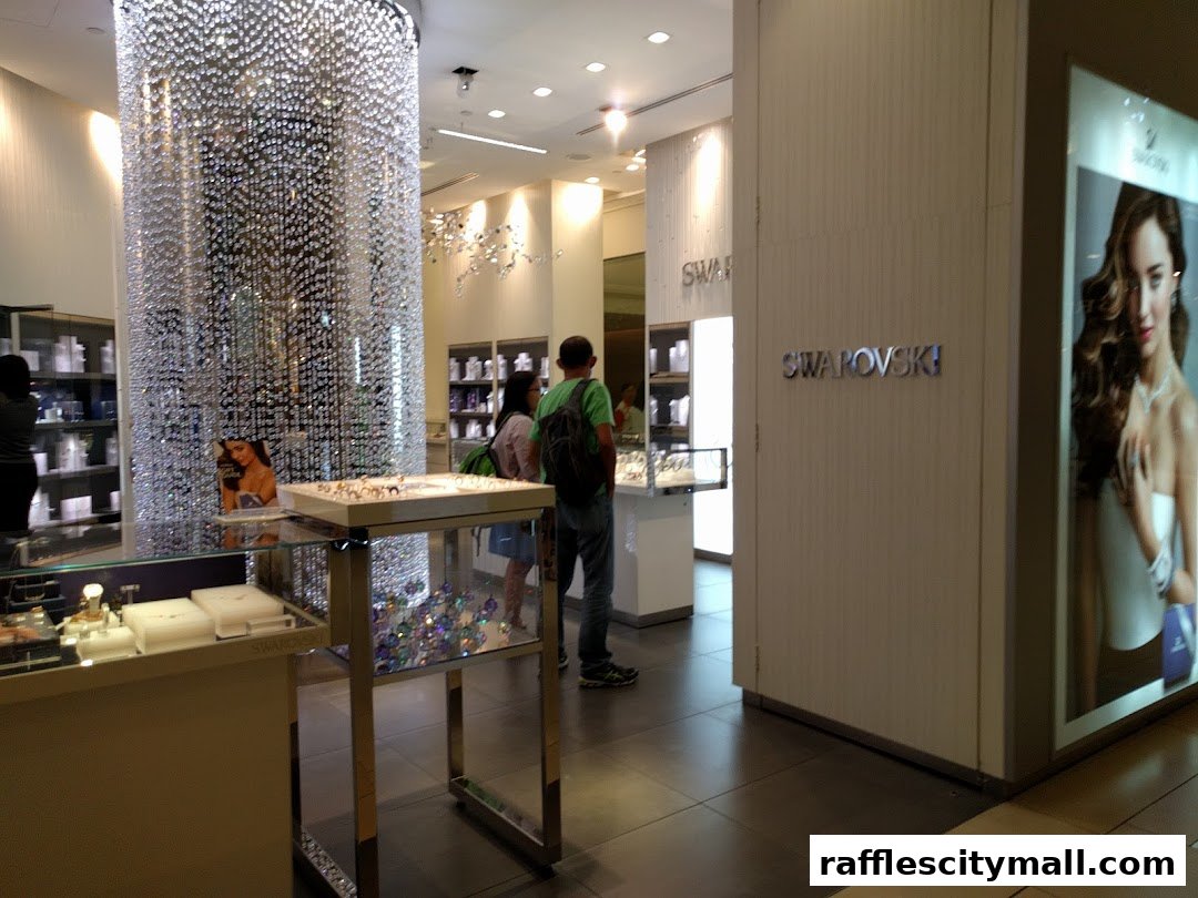 Interior view of a Swarovski store with sparkling crystal displays and jewelry.