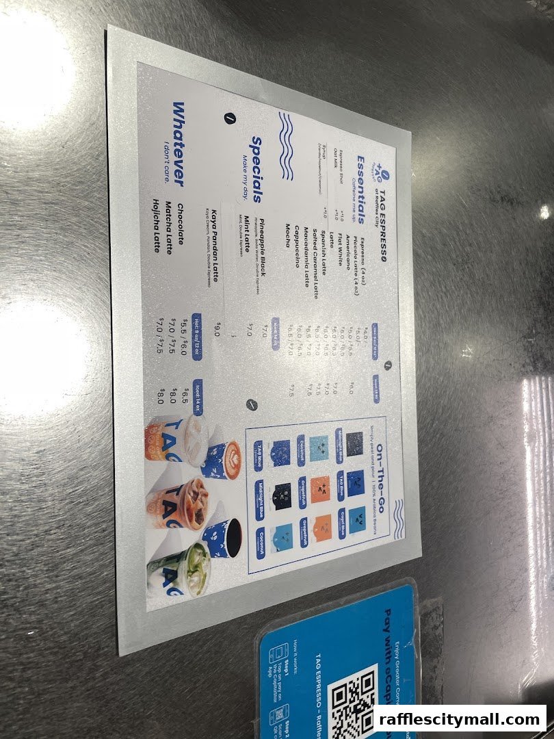A menu from TAG Espresso at Raffles City displaying various coffee drinks and specials.