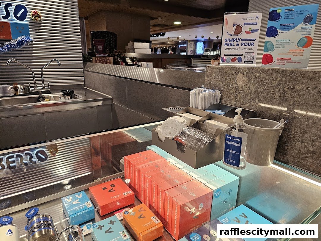 A display of coffee capsules and a hand sanitiser station at TAG Espresso.