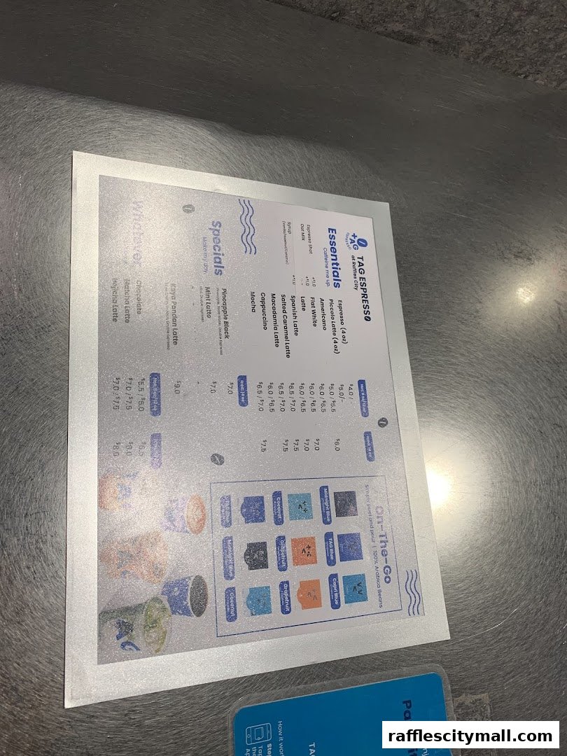 A menu from TAG Espresso at Raffles City featuring coffee drinks and specials.