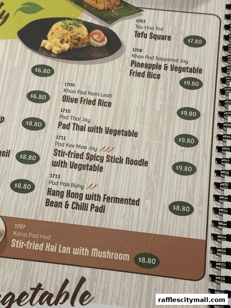 A close-up of a Thai Express menu featuring various noodle and rice dishes with prices.