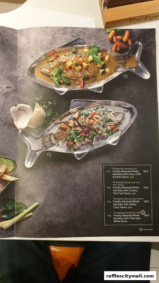 A menu from Thai Express featuring two whole steamed fish dishes.