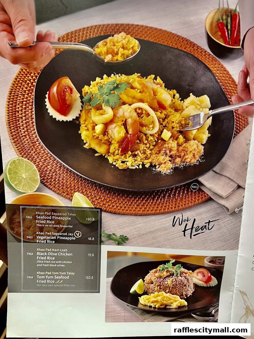 A close-up of Thai Express pineapple fried rice dishes with menu details.