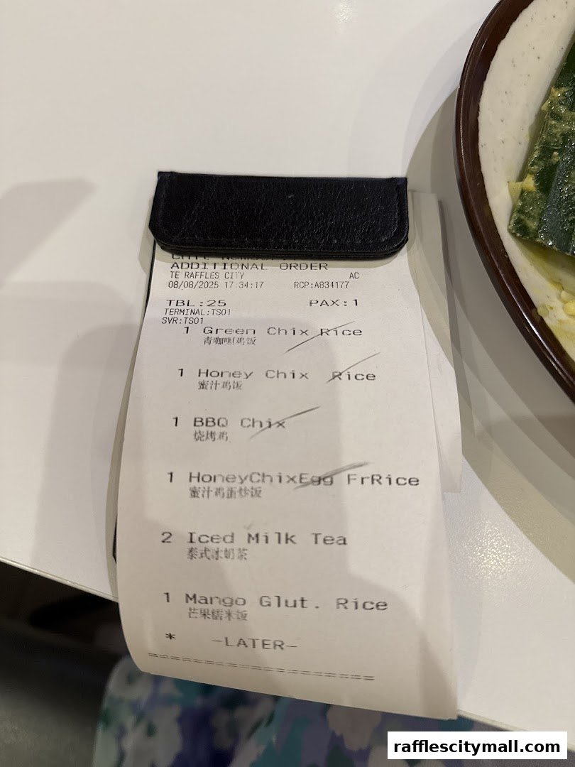 A receipt from Thai Express showing an additional order with various Thai dishes and drinks.