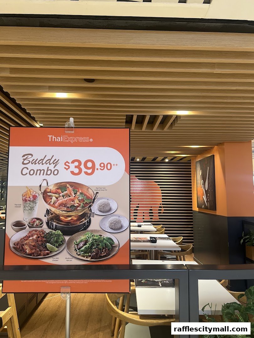 A sign advertising a Thai Express Buddy Combo meal with various dishes and a price.