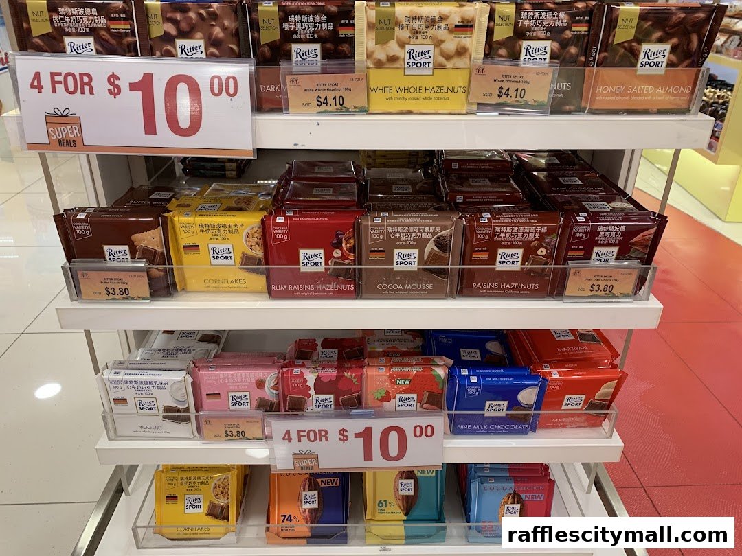 Shelves stocked with various Ritter Sport chocolate bars, featuring different flavors and promotions.