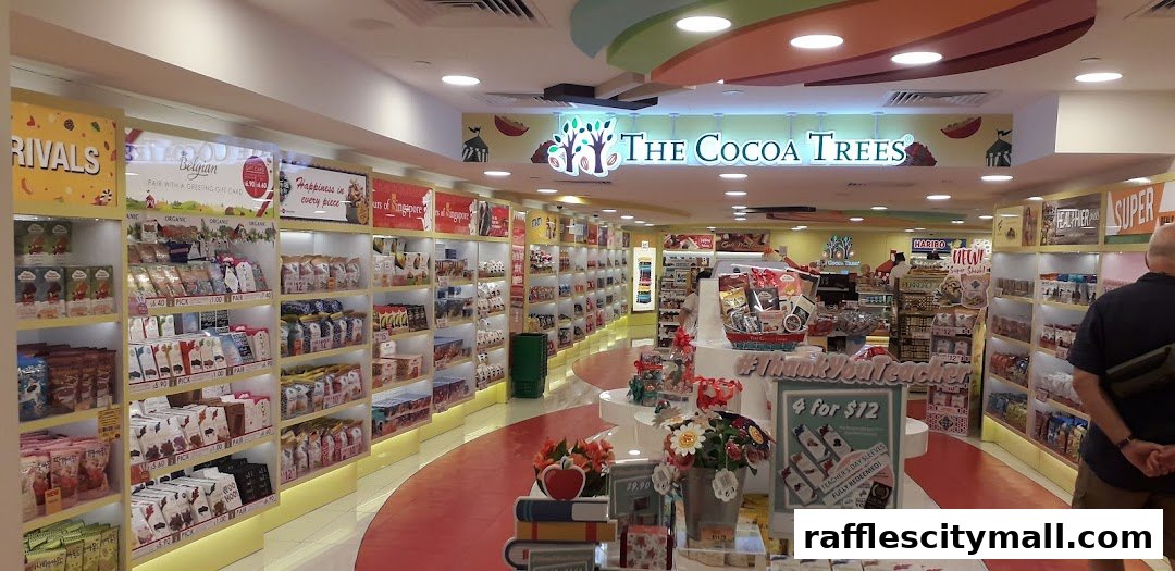 Interior view of The Cocoa Trees shop, showcasing shelves filled with chocolates and gift items.