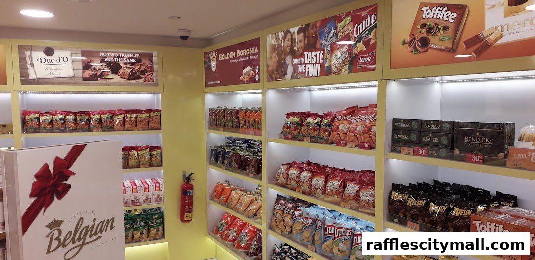A well-lit shop interior displaying shelves filled with various chocolates and snacks.