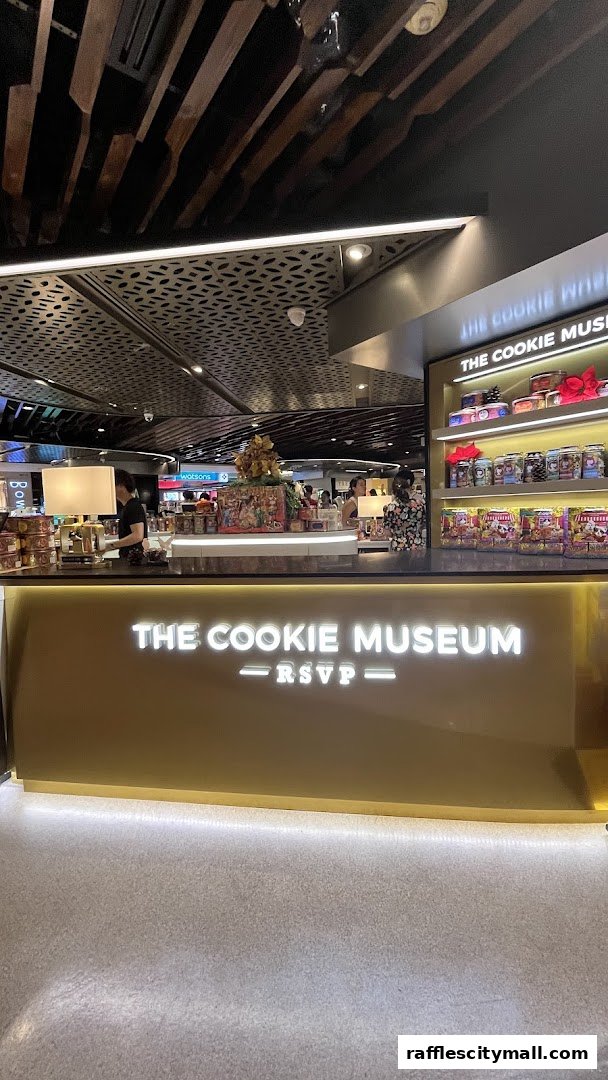 The Cookie Museum shop front with illuminated signage and display shelves filled with cookies.