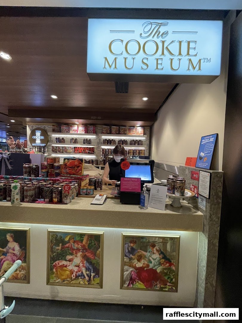 The Cookie Museum shop front with a display of cookies and a cashier.