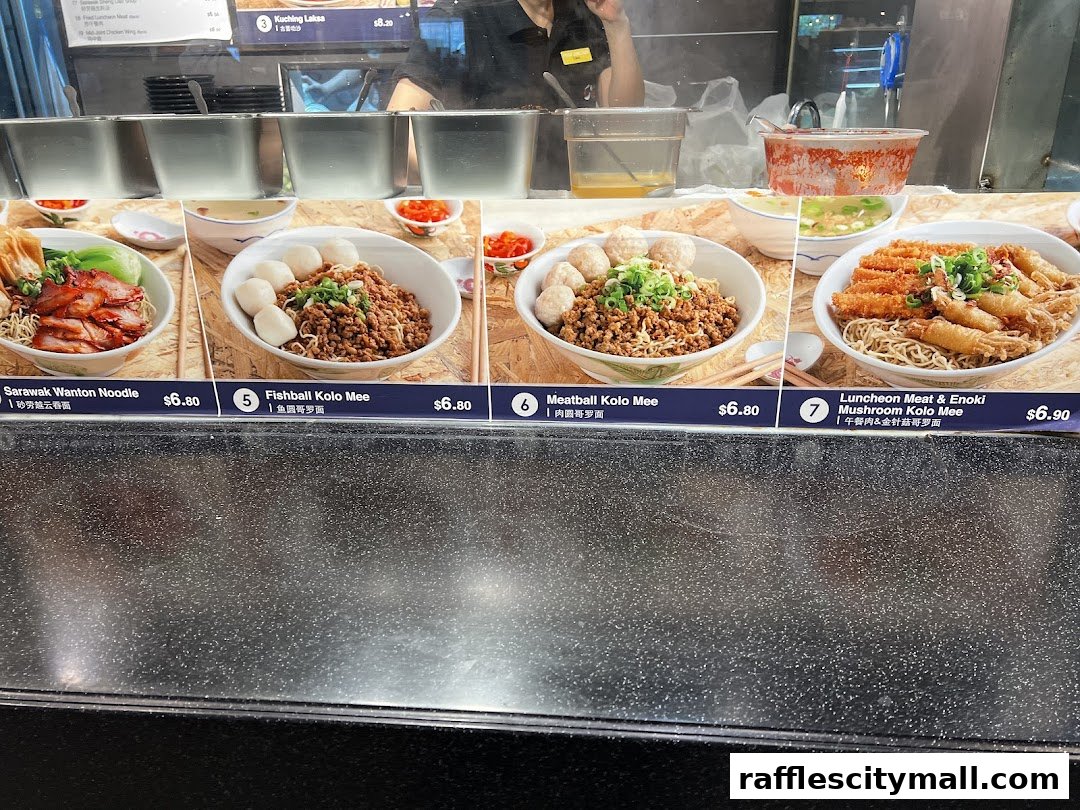A display of various noodle dishes with prices and descriptions.