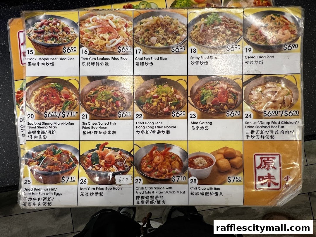 A menu displaying various Asian noodle and rice dishes with prices and images.