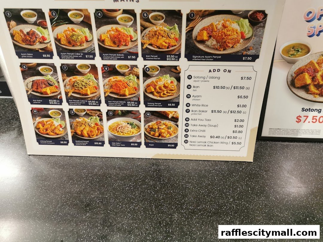 A menu display featuring various Malaysian dishes with images and prices.