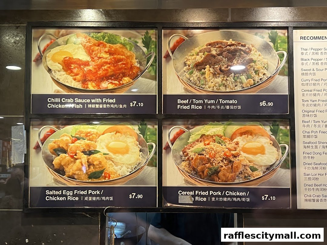 A menu board displaying four different rice dishes with prices.