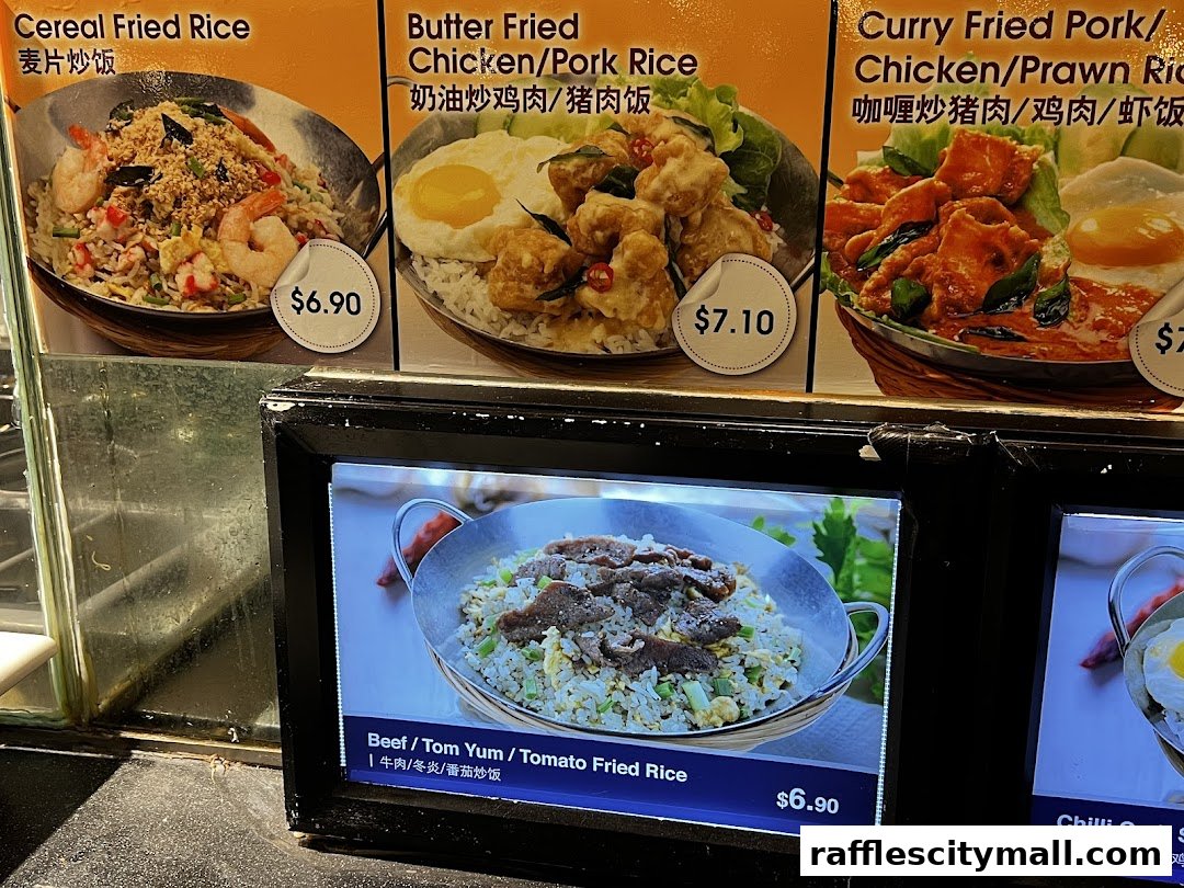 A display of various fried rice dishes with prices and descriptions.
