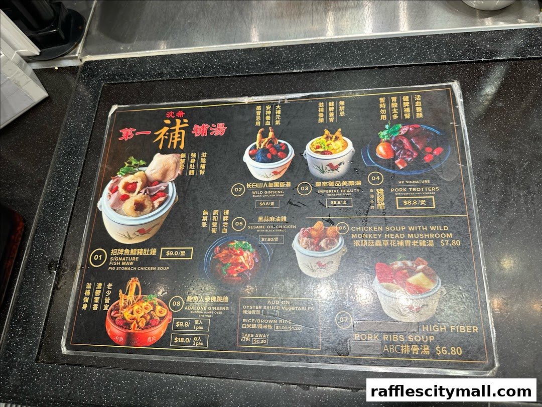 A menu board displaying various soups and dishes with images and prices.