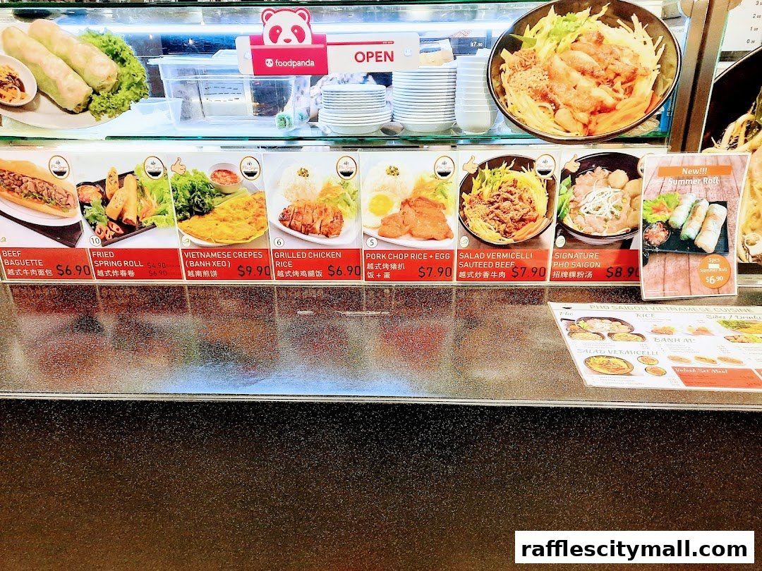 A display of Vietnamese food dishes with prices and descriptions.