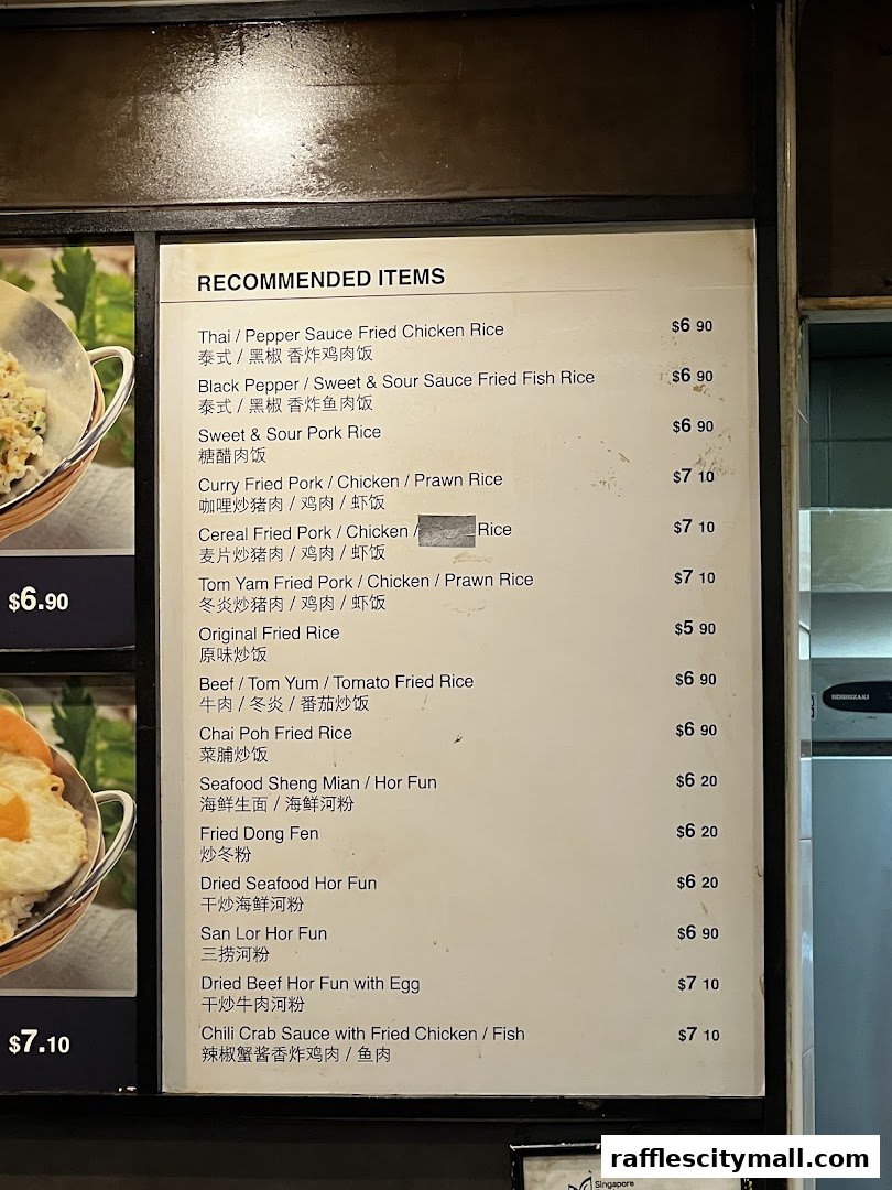 A menu board displaying recommended food items with prices and Chinese translations.