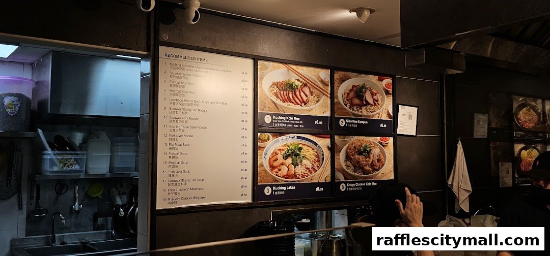 A menu board displaying recommended noodle dishes with prices and images.