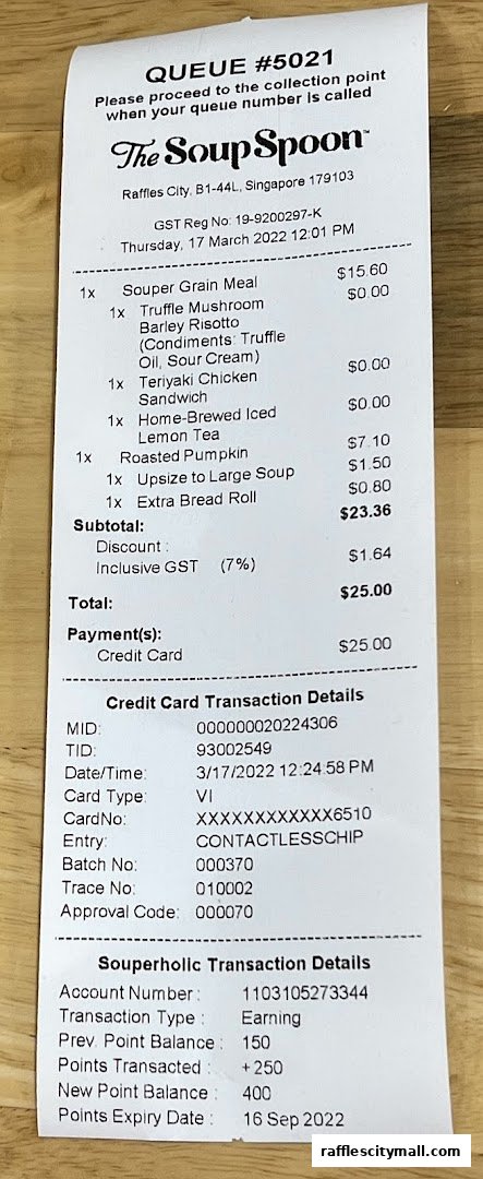 A receipt from The Soup Spoon showing purchased items and transaction details.