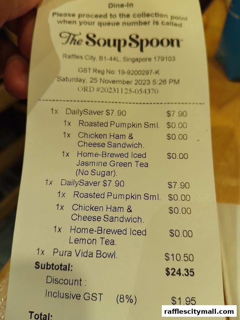 A receipt from The Soup Spoon showing purchased items and their prices.