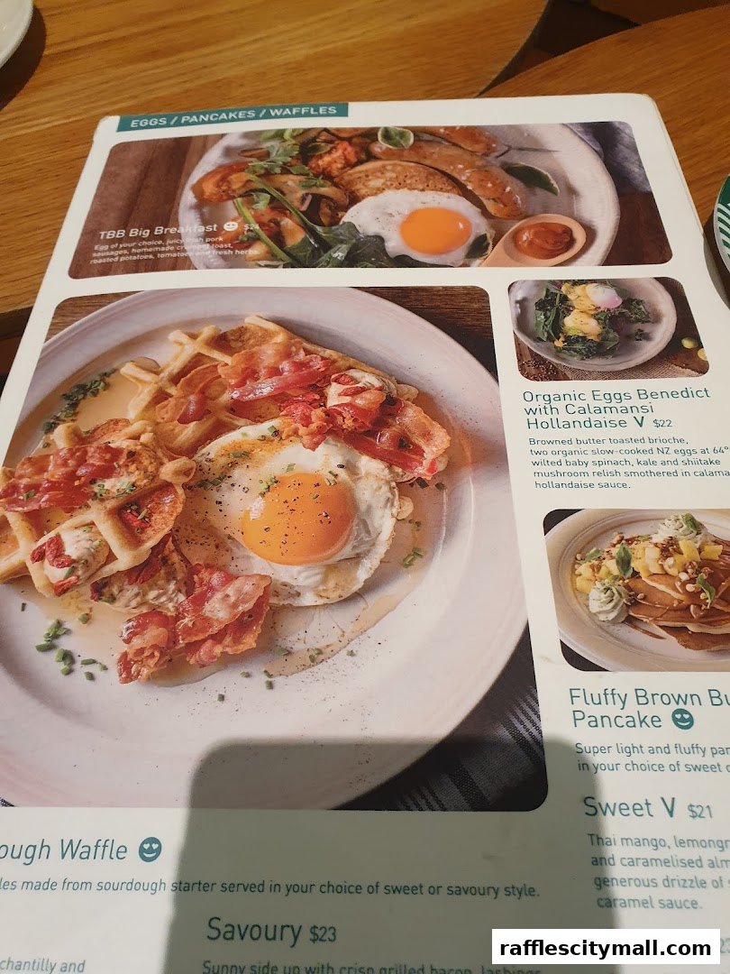 A menu featuring delicious breakfast dishes like waffles, pancakes, and eggs.