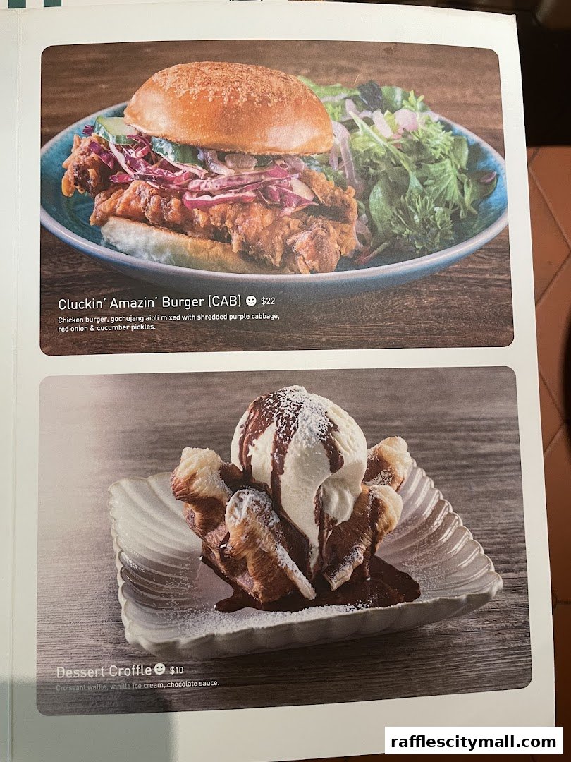 A menu featuring a fried chicken burger and a dessert croffle with ice cream.