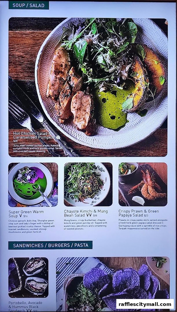 A menu display featuring salads, soups, and sandwiches with enticing descriptions and prices.