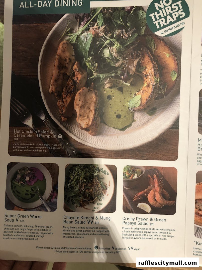 A menu featuring several dishes including chicken salad, soup, and prawn salad.
