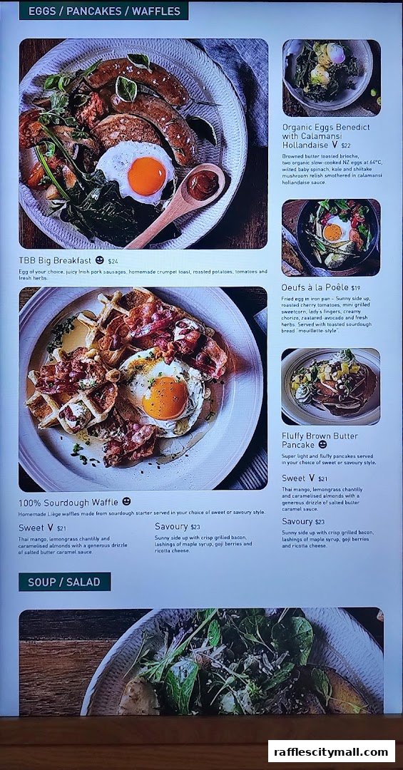 A menu page showcasing various breakfast and brunch dishes with enticing food photography.