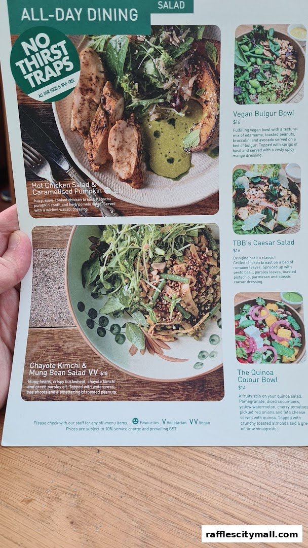 A menu page from Tiong Bahru Bakery featuring salads and bowls with enticing descriptions and prices.
