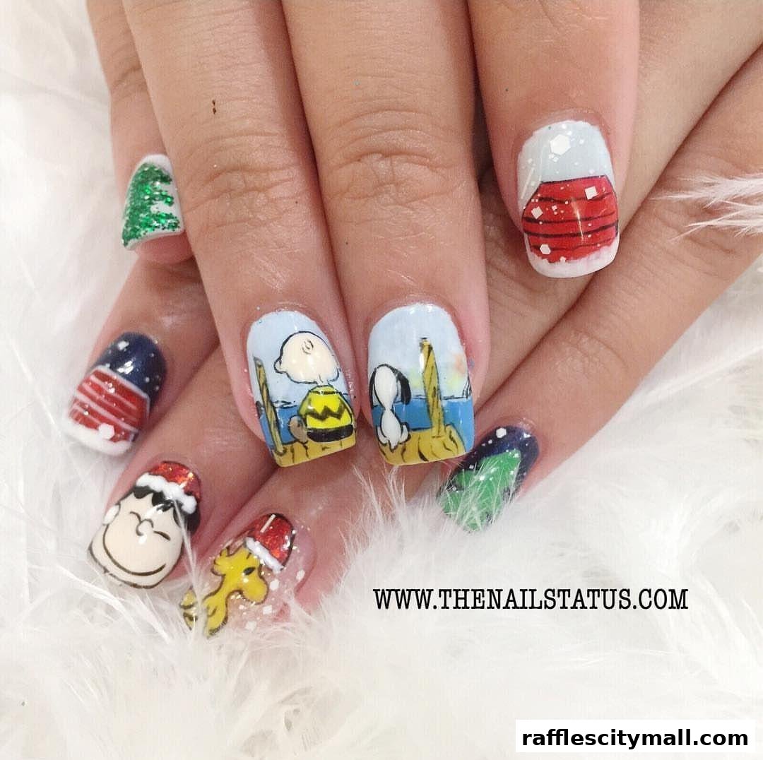 Close-up of hands with intricately painted Peanuts-themed Christmas nails.