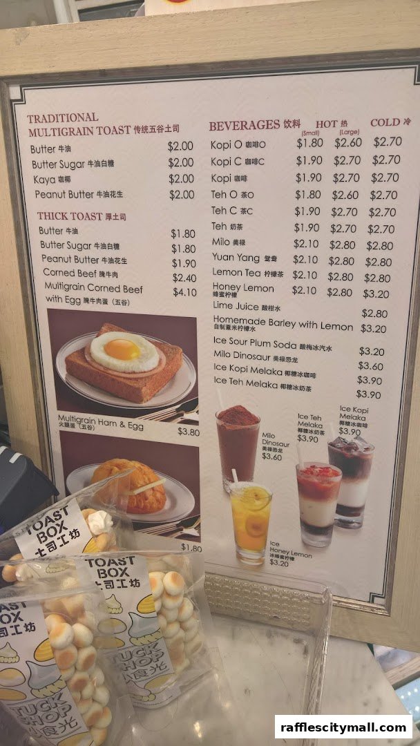 A menu board from Toast Box Raffles City featuring traditional and thick toasts, beverages, and food items.