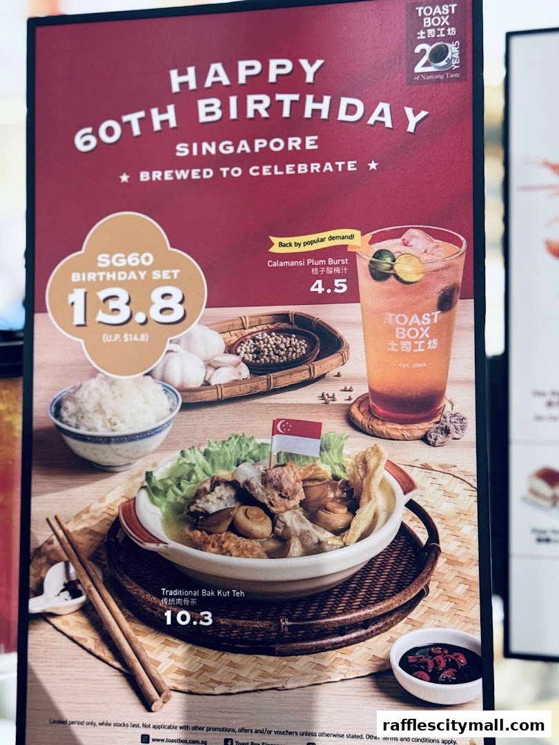 A promotional sign for Toast Box celebrating Singapore's 60th birthday with food and drink specials.
