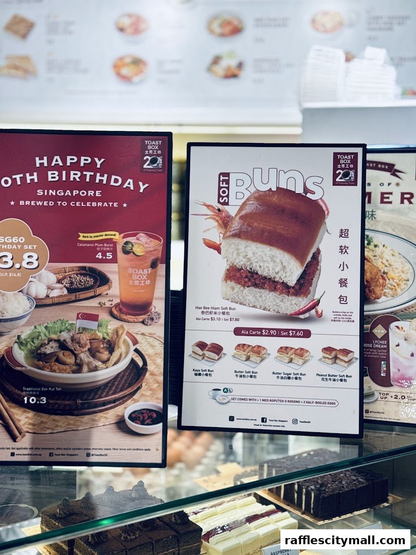 A display of Toast Box's menu items, featuring soft buns and traditional dishes.