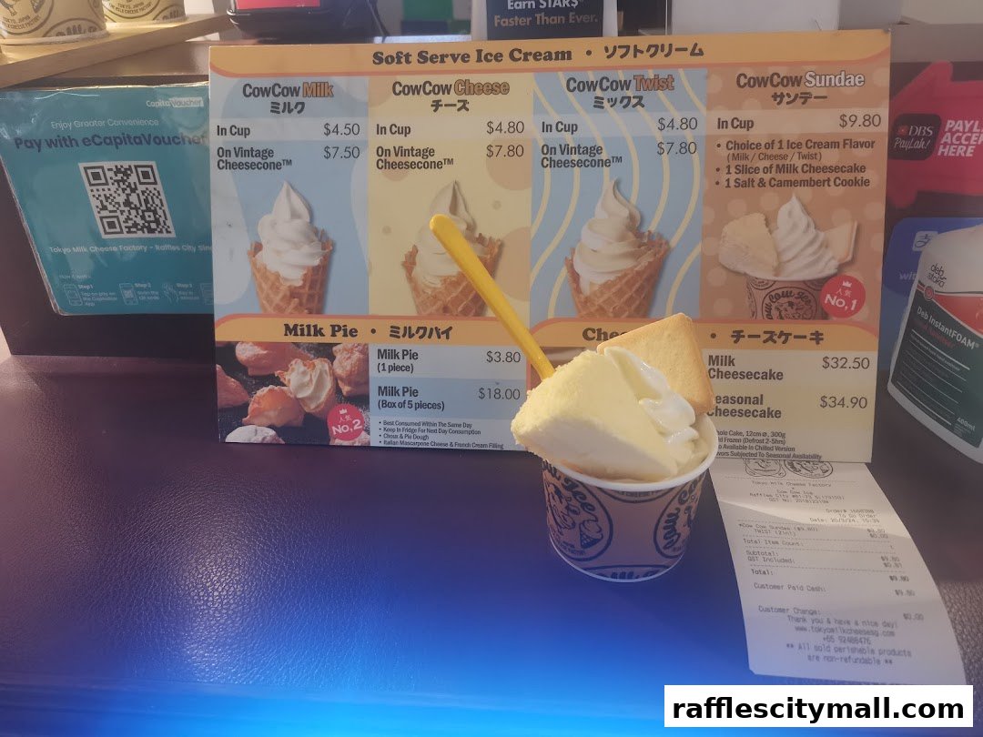 A menu board showcasing soft serve ice cream, milk pies, and cheesecakes from Tokyo Milk Cheese Factory.