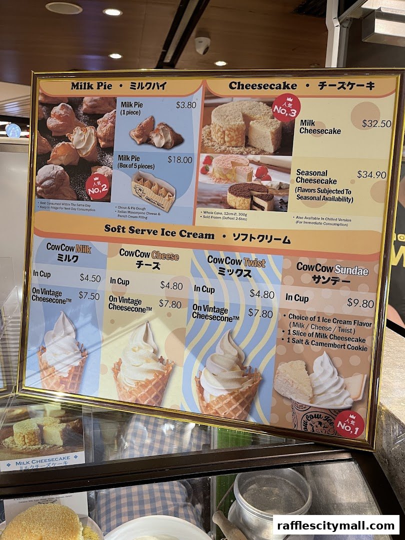 A menu board displaying various milk pies, cheesecakes, and soft-serve ice creams with prices.