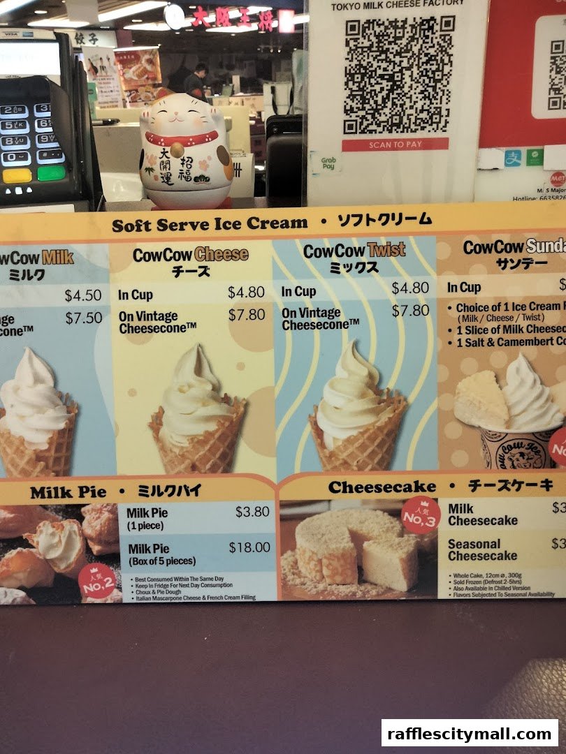 A menu board for Tokyo Milk Cheese Factory featuring soft serve ice cream, milk pies, and cheesecakes.