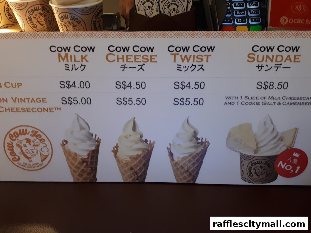 A menu board displaying various ice cream flavors and prices from Tokyo Milk Cheese Factory.