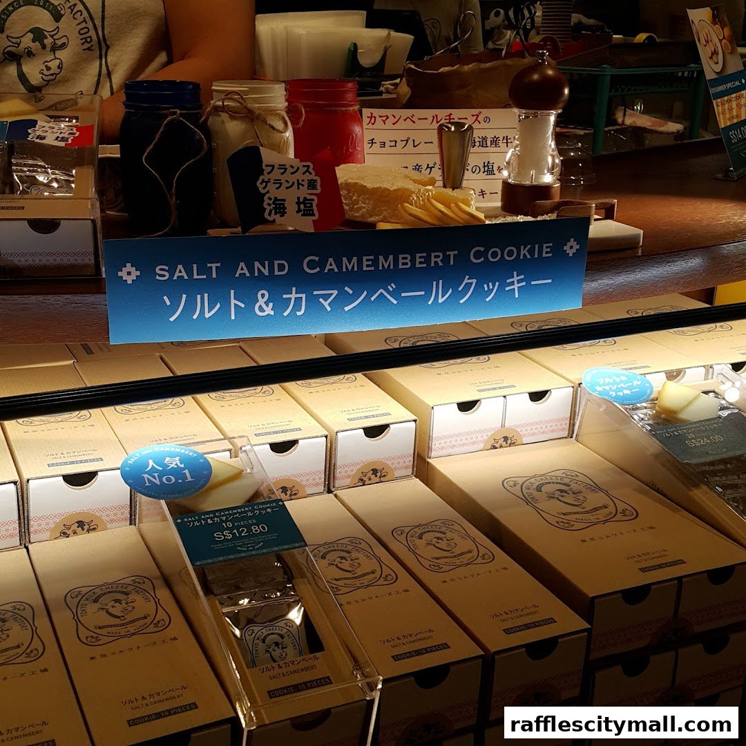 Display of Tokyo Milk Cheese Factory's Salt and Camembert cookies with product packaging and ingredients.