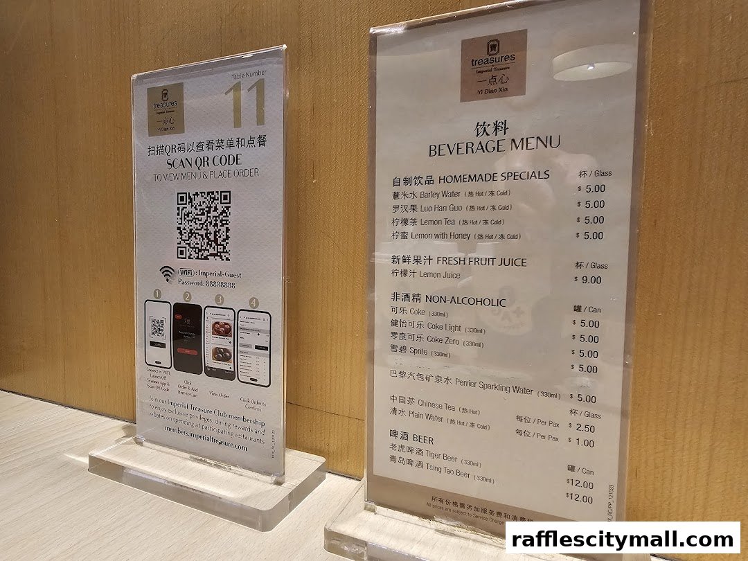 A beverage menu from Treasures Yi Dian Xin with various drink options and prices.