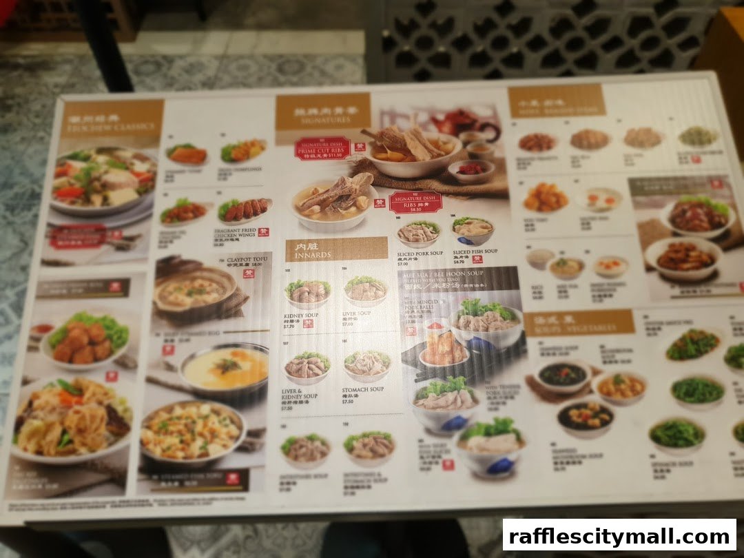 A menu from Treasures Yi Dian Xin featuring various soups, innards, and classic dishes.