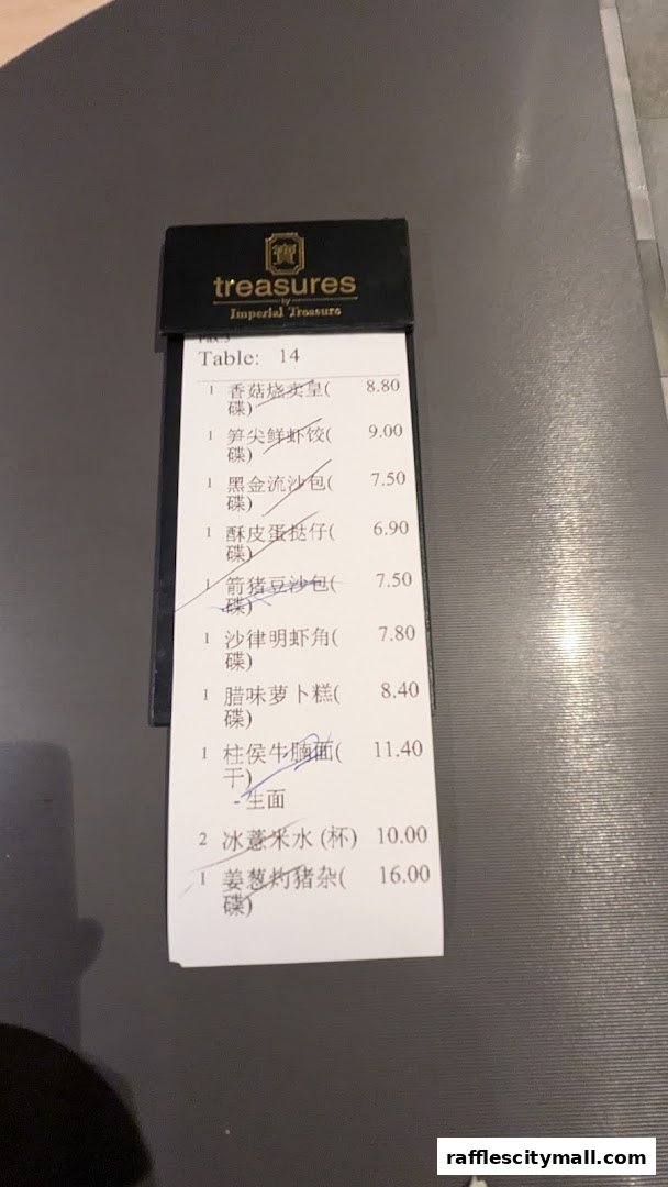 A receipt from Treasures Imperial Treasures showing a list of food items and prices.