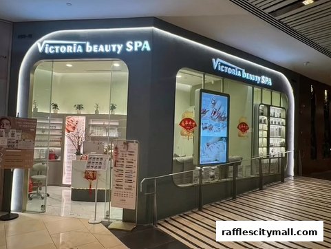 The exterior of Victoria Beauty SPA, a modern and well-lit salon with a digital display and product shelves.