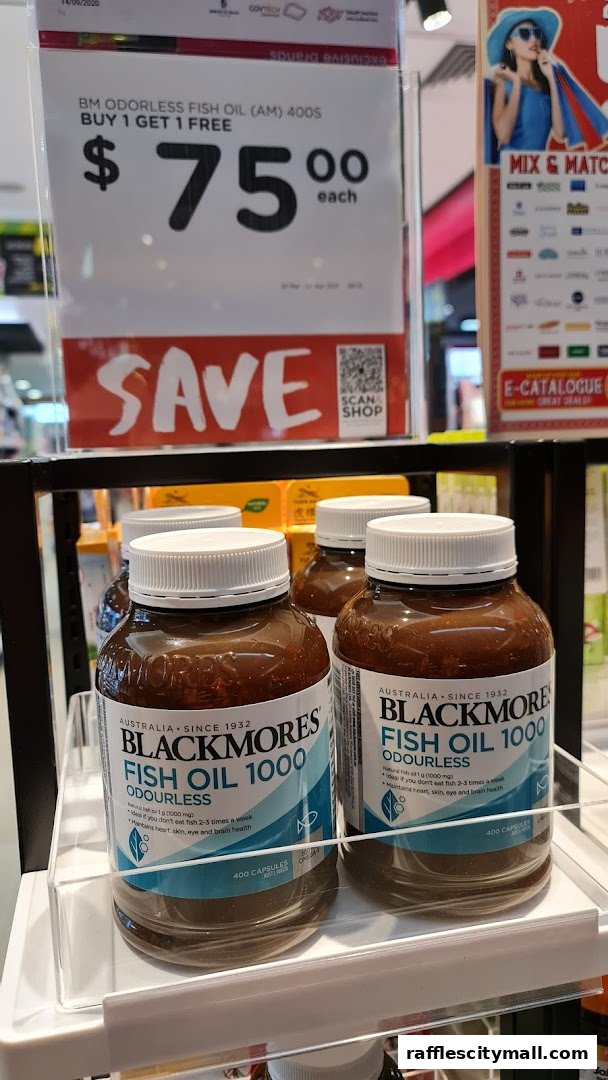 Blackmores Fish Oil bottles on display with a 'Buy 1 Get 1 Free' promotion.