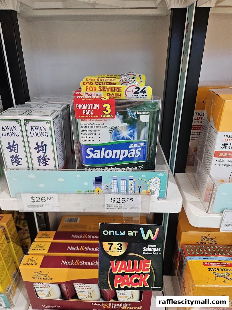 A display of pain relief patches and balms, including Salonpas and Tiger Balm products.