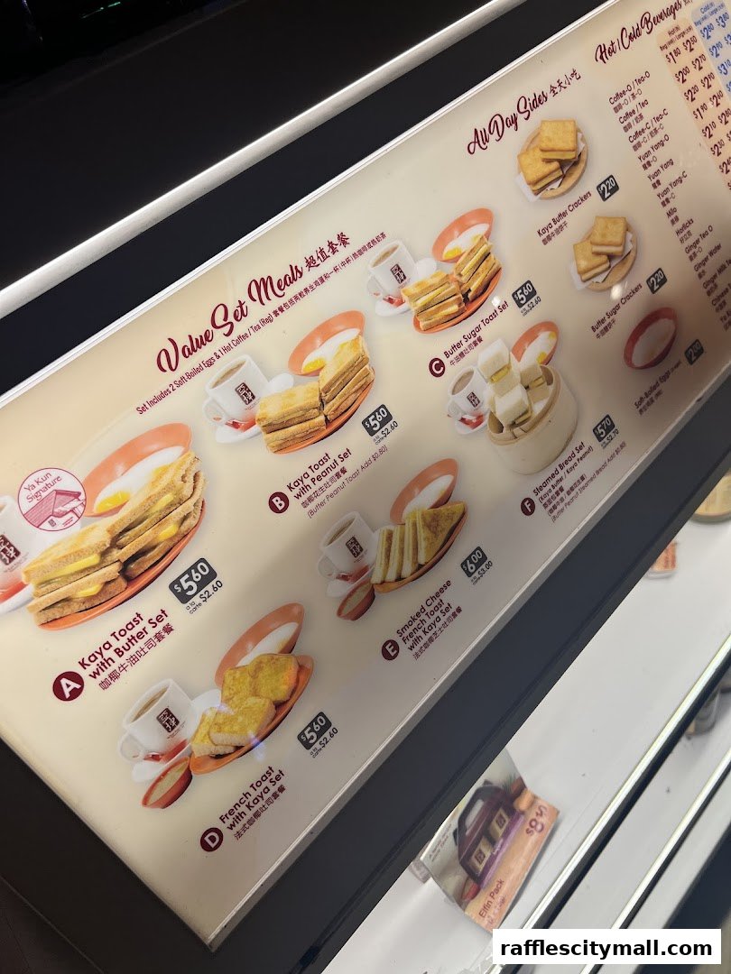 A menu board displaying various set meals and beverages from Ya Kun Kaya Toast.