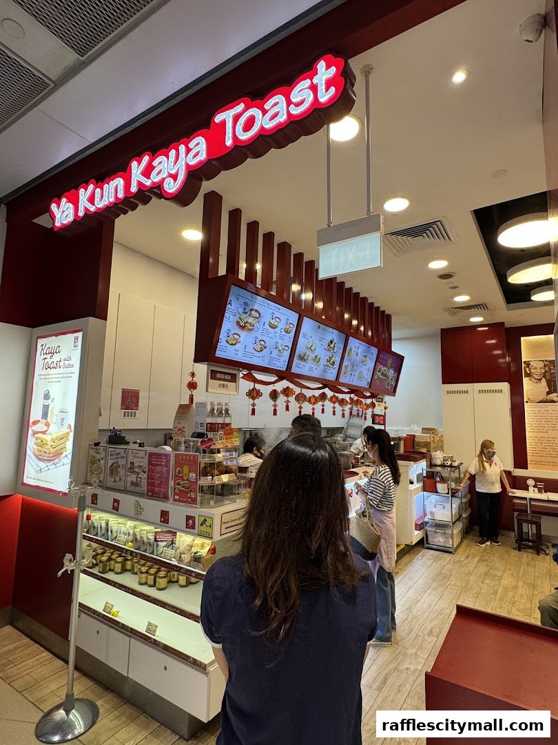 Customers queue at Ya Kun Kaya Toast, a popular eatery known for its traditional breakfast.
